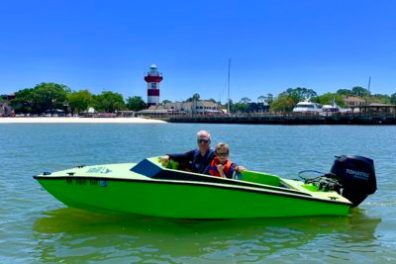 Speedboat dolphin cruise Infront of harbortown lighthouse